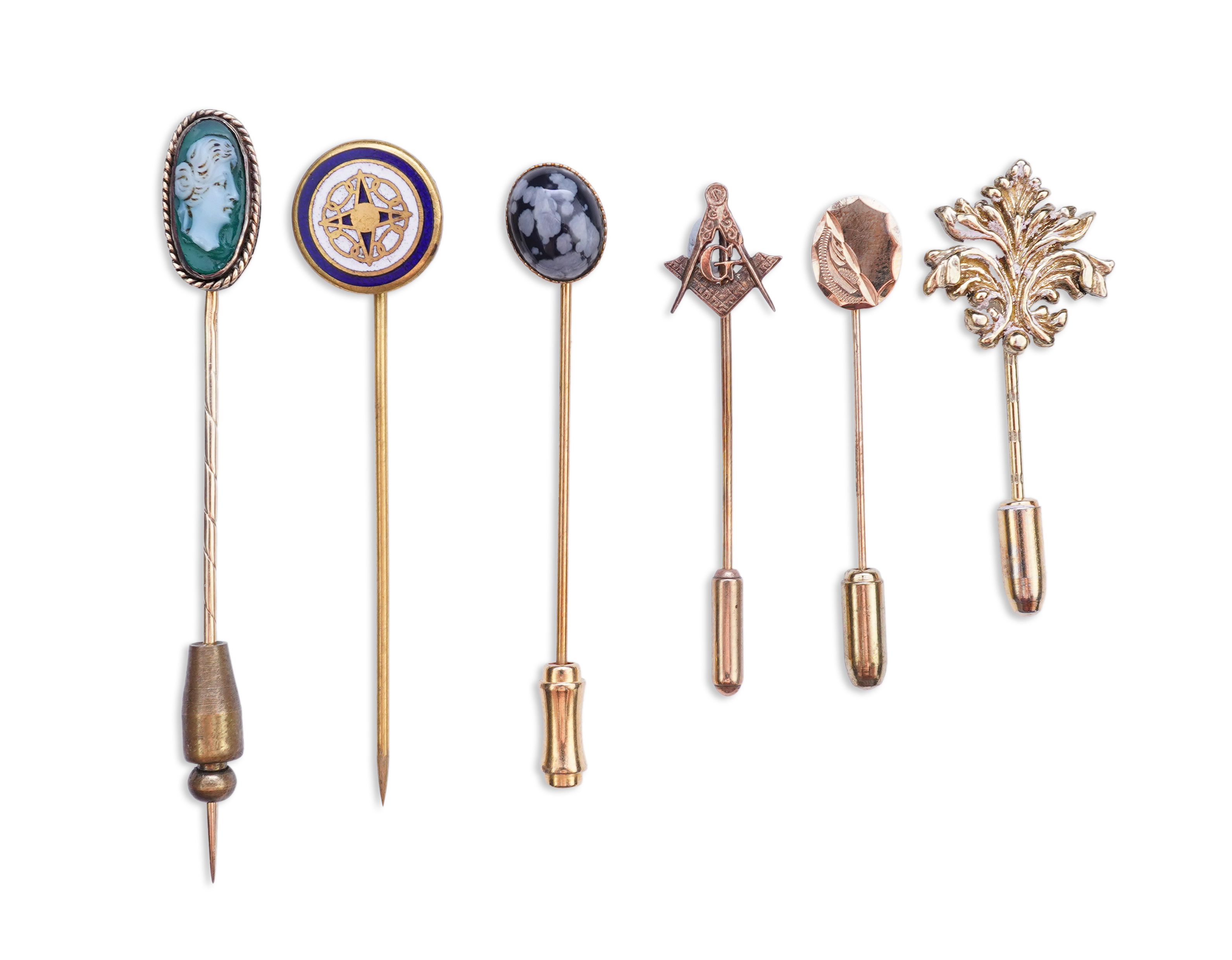 A collection of six stick pins, comprising: three gold stick pins, one set with a hardstone cameo, Austrian assay marks; a gold stick pin with a faceted edge; and a gold stick pin of Masonic design, stamped 9CT, combined